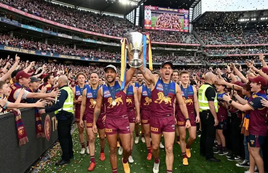 Brisbane Lions Players Carrying their Championship Trophy 