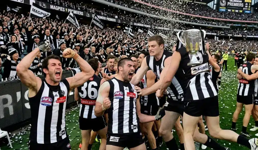 Players of Collingwood Celebrating Their Win 